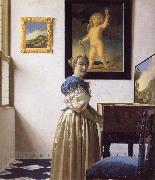 A Young Woman Standing at a Virginal, JanVermeer